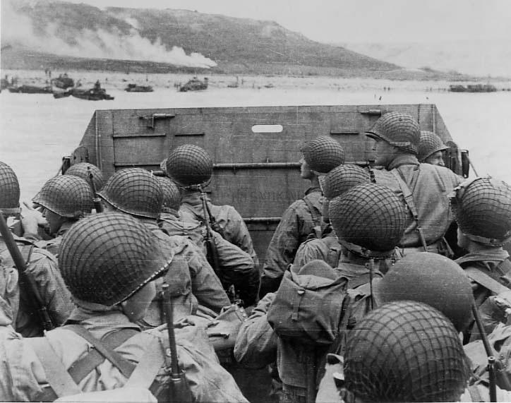 US troops on a landing craft approaching Normandy beach